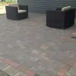 a patio with chairs on it