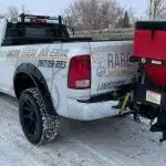 a white truck with a red trailer